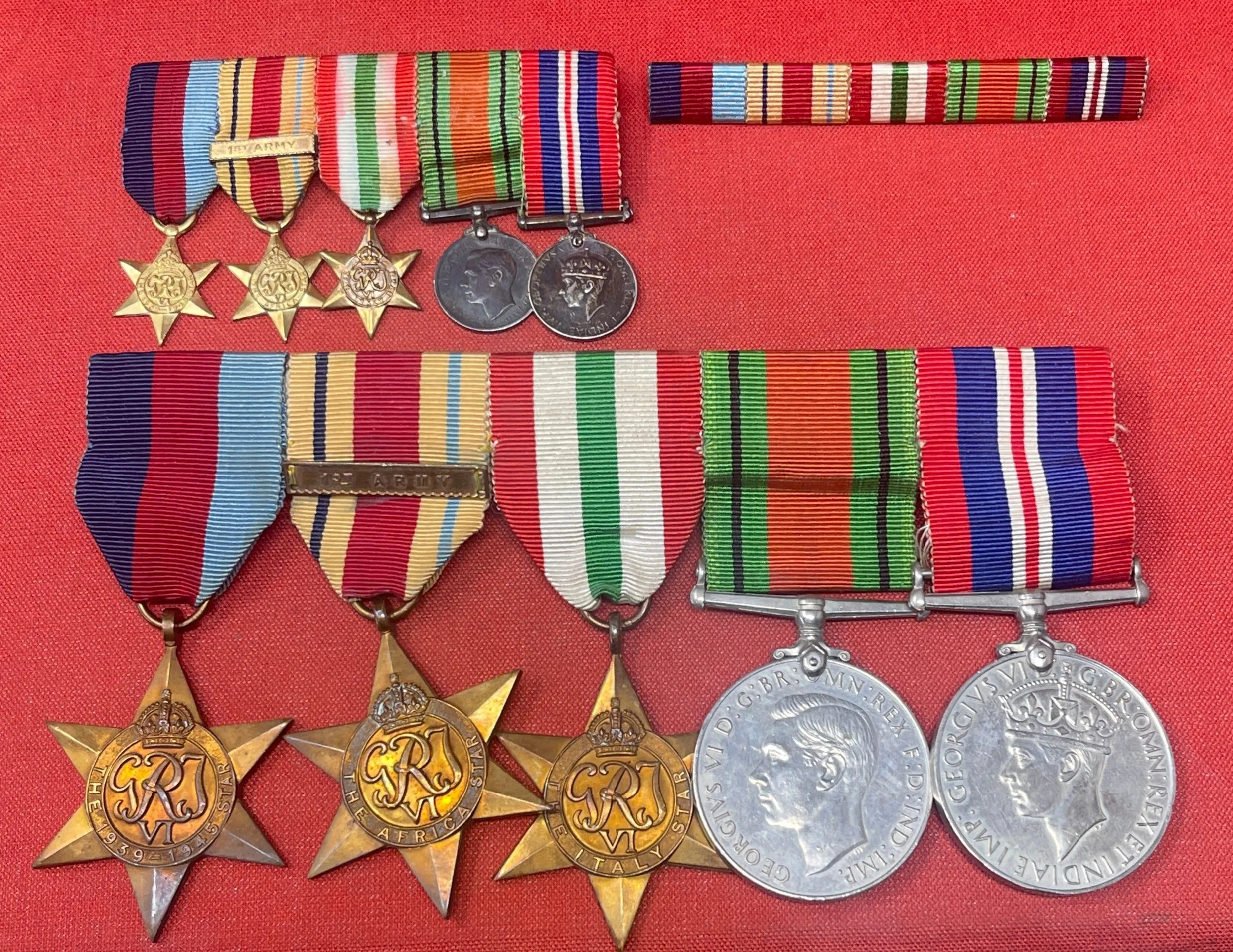 A WWII Medal Group Defence Medal, War Medal, Italy, Africa and 1939-45 Star