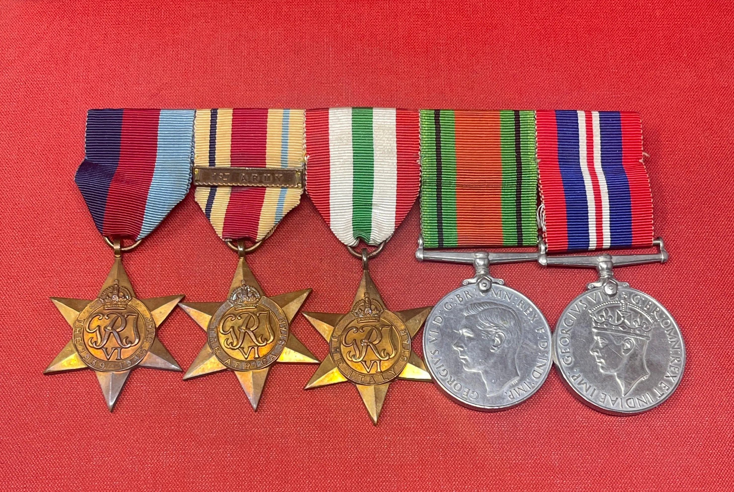 A WWII Medal Group Defence Medal, War Medal, Italy, Africa and 1939-45 Star