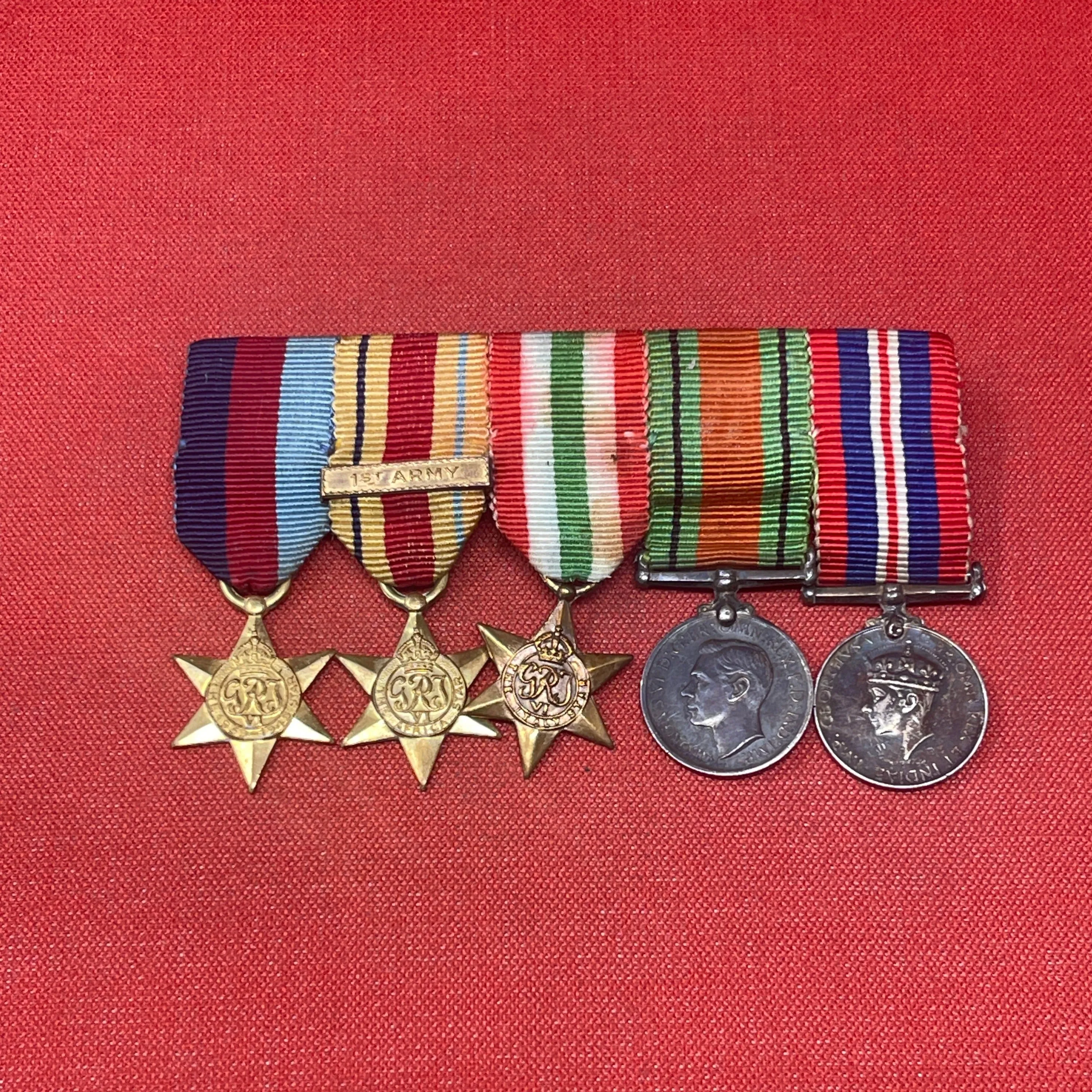 A WWII Medal Group Defence Medal, War Medal, Italy, Africa and 1939-45 Star